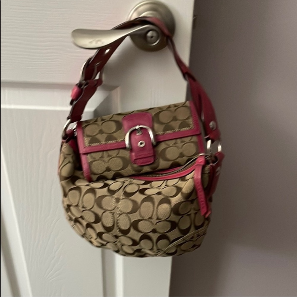 Tan and pink coach signature shoulder bag with matching large wallet